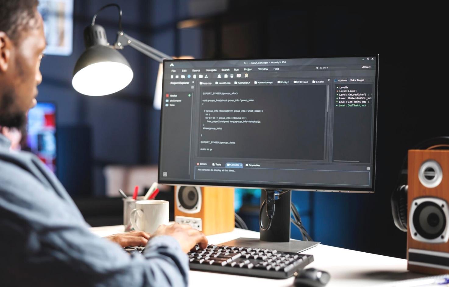 Developer working on adaptive web interface with modern development tools
